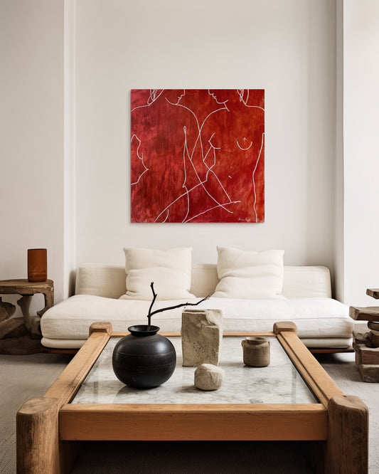 Modern living room with a white sofa, wooden coffee table, and abstract red painting.