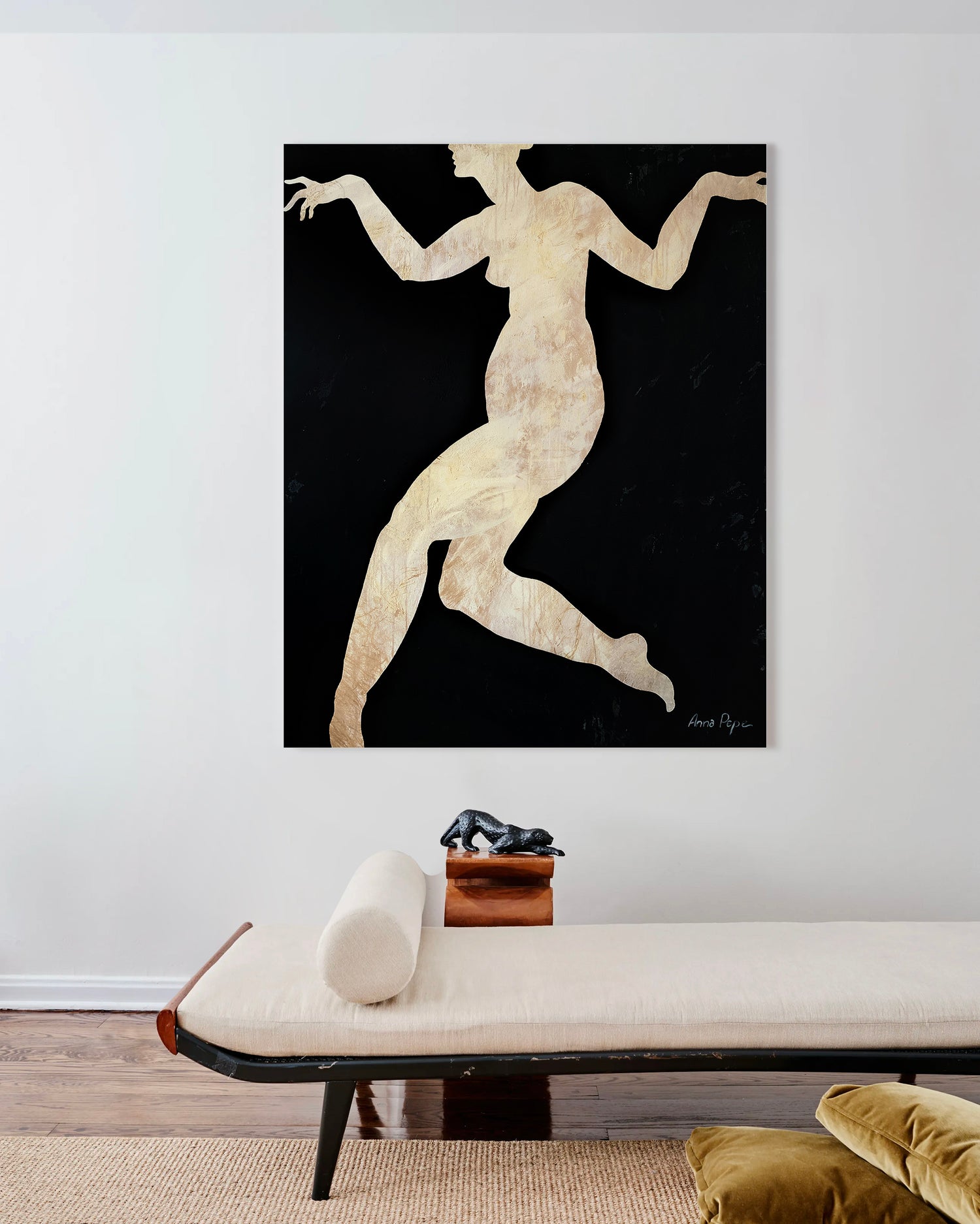 Abstract painting of a nude figure on a black background in a modern living room. Artist Anna Pepe