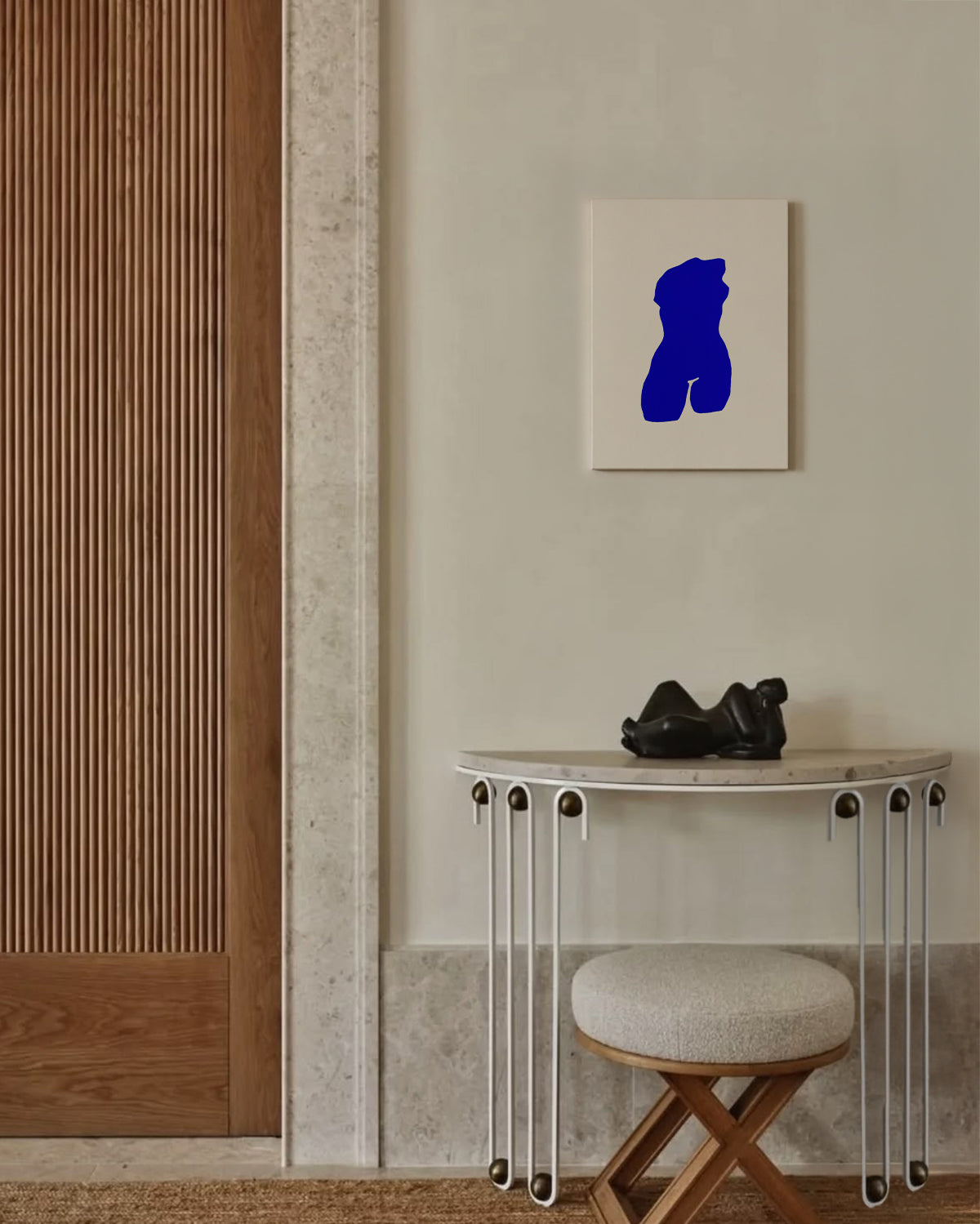 Modern interior with a console table, stool, and abstract blue sculpture on the wall. artist anna pepe, forn studio, abstract painting, small art work, female abstract form